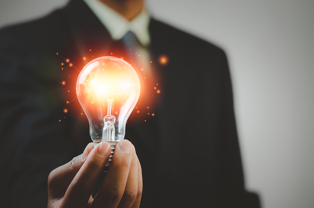 hand holding light bulb ideas Great inspiration and innovation